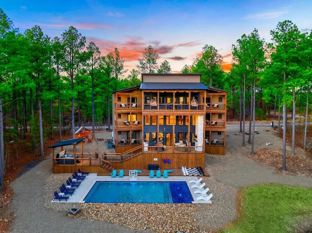 The Bosworth luxury cabin with pool at sunset Mogul Club